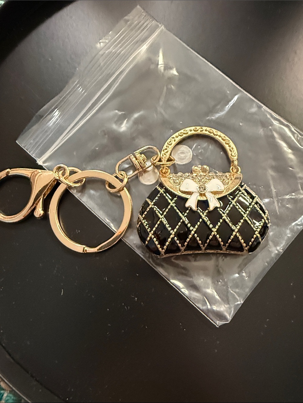Gold & Black Quilted Purse charm.